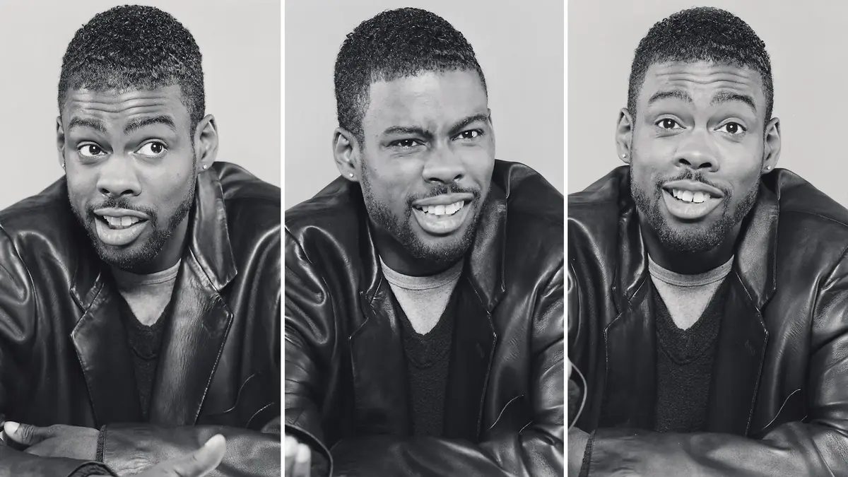Chris Rock making three different faces.