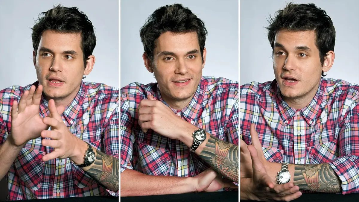 John Mayer in a plaid shirt making three different faces.