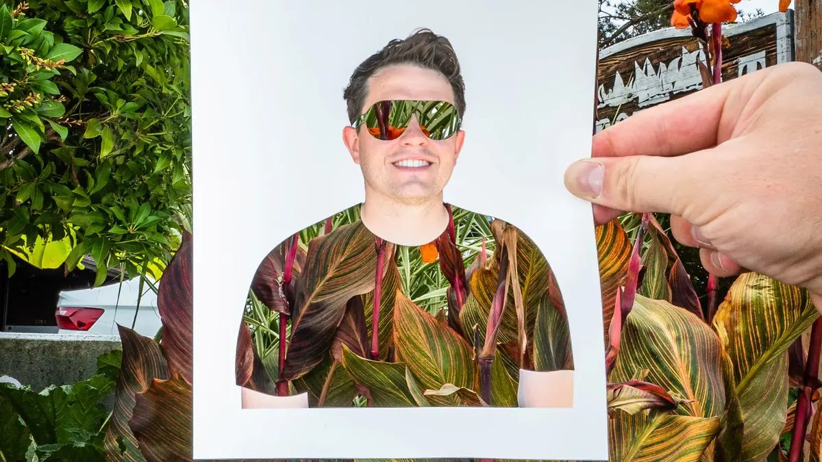 Rudy Willingham cutout of himself with floral accents.
