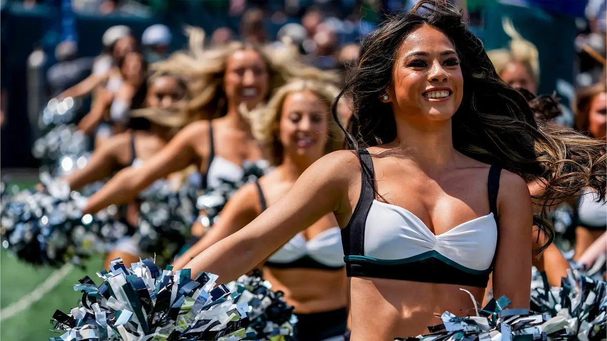 Cheerleaders for the NFL's Philadelphia Eagles on the sidelines of a game.