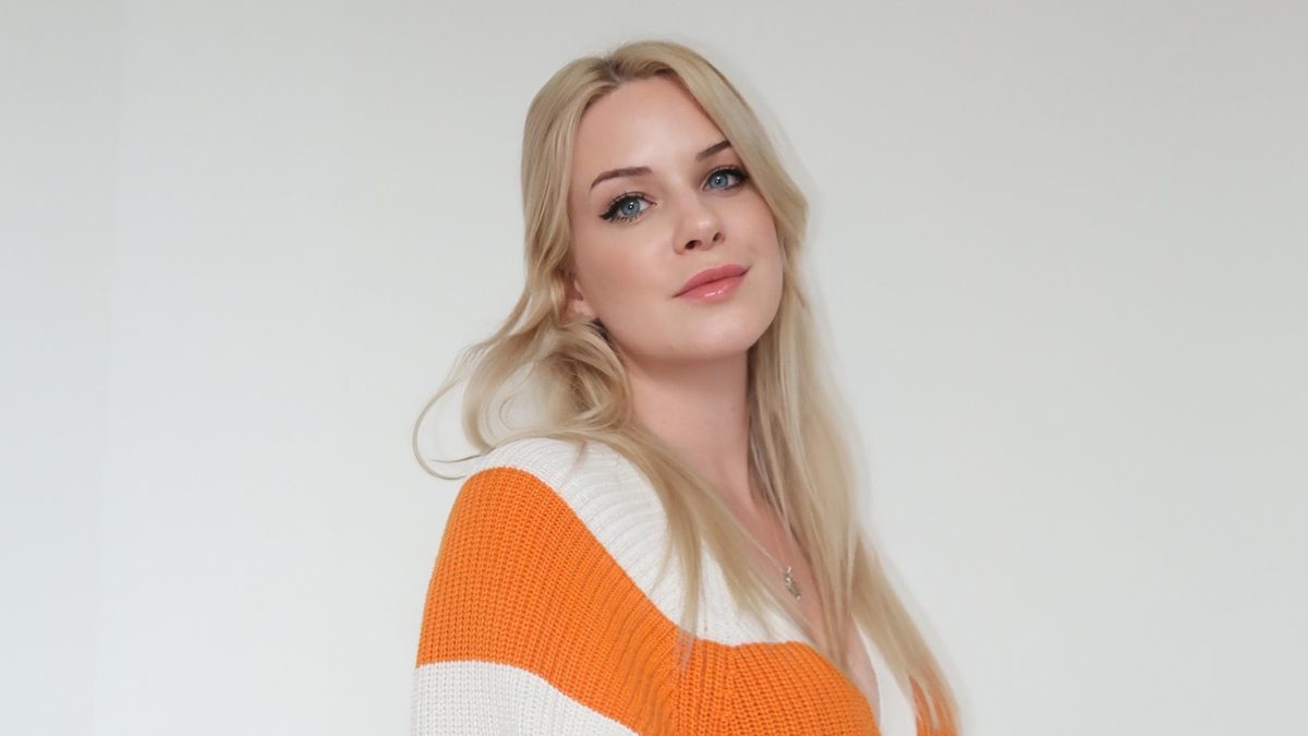 Jessica Spice in a striped sweater.