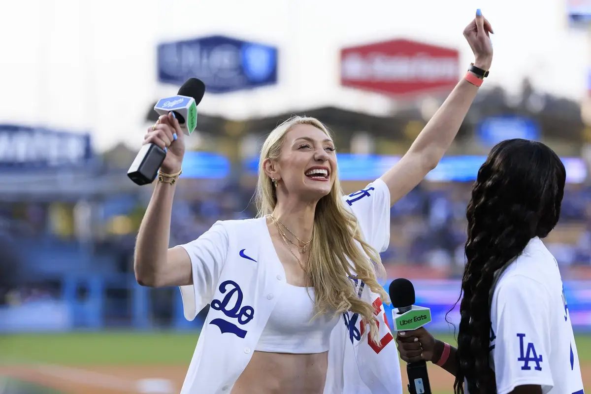 Los Angeles Sparks forward Cameron Brink attends a baseball game at Dodger Stadium with teammate Rickea Jackson.