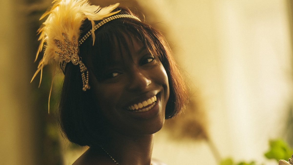 Aubri Ebony in holiday flapper outfit.