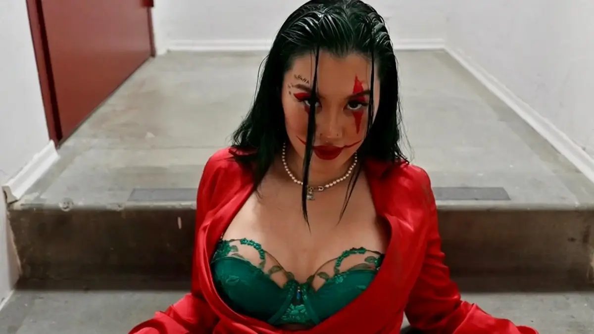 Princess April Joker sitting.