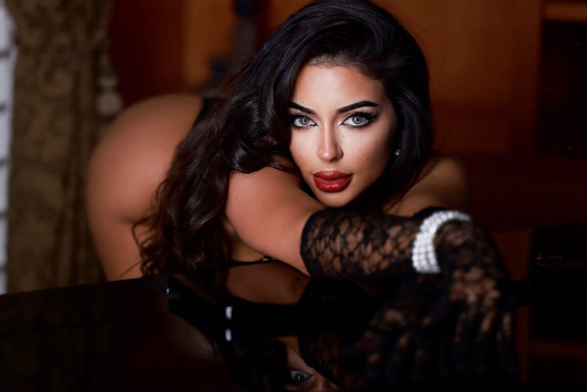 Playboy Club creator Christina Enaa is a talented poet and designer who loves Superman.