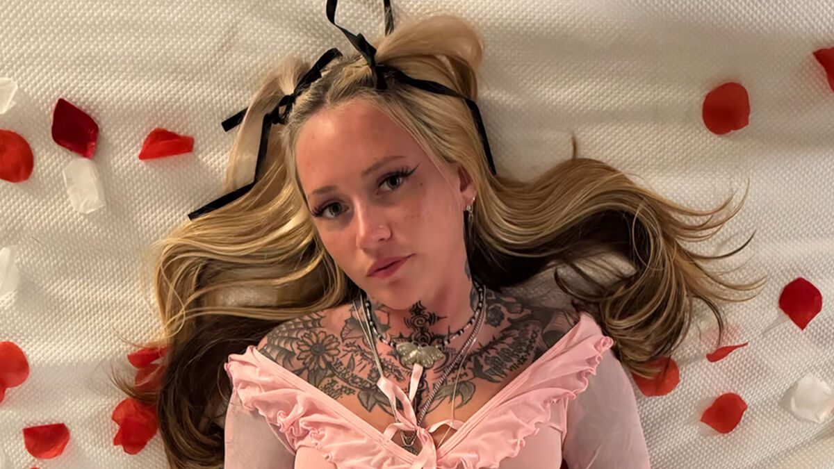 Cherry Cream in bed with roses