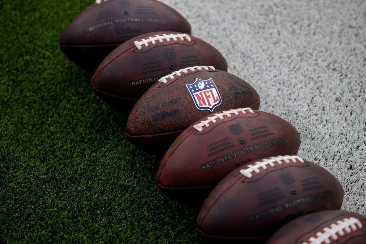 NFL footballs on field