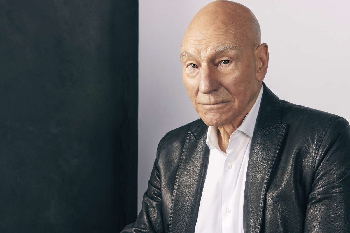 Patrick Stewart looking at the camera seriously.